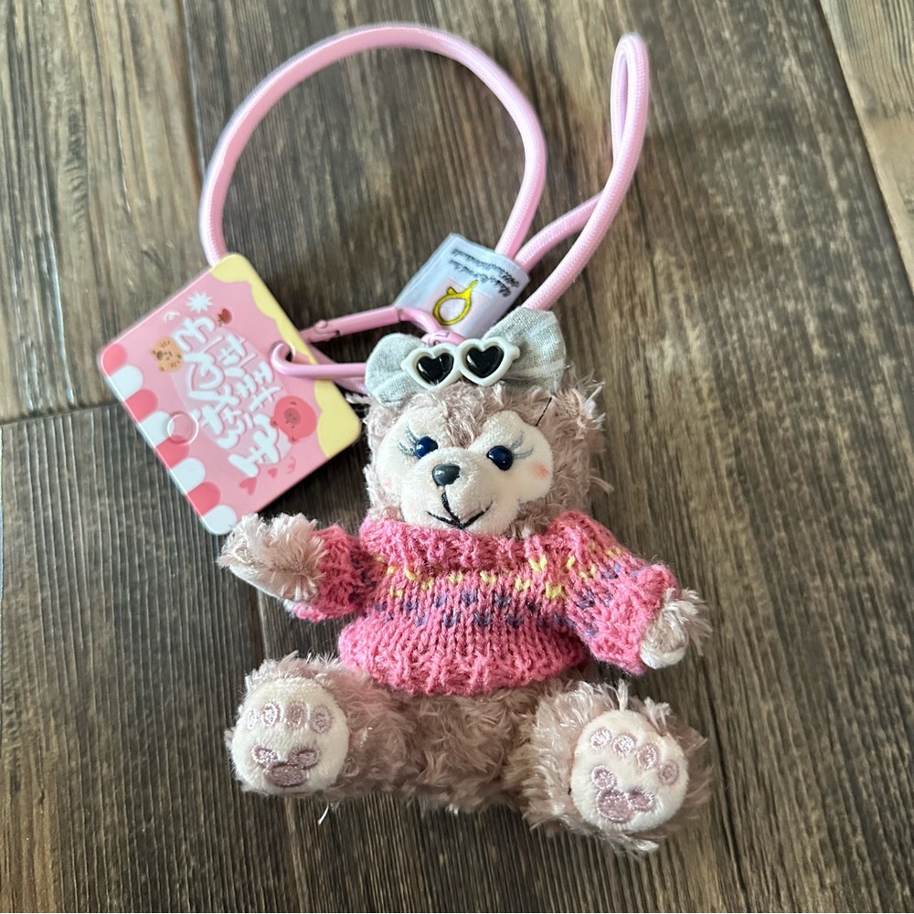 Stuffed bear with sweater and heart glasses with clip and cord. Key or bag charm